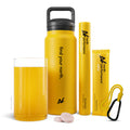 NORTH drink bottle, carabiner, NORTH Performance Foundation supplement product tube, and NORTH Performance Ultra supplement product sachet. There is also a glass full of water and the NORTH supplement product.