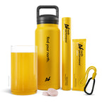 NORTH drink bottle, carabiner, NORTH Performance Foundation supplement product tube, and NORTH Performance Ultra supplement product sachet. There is also a glass full of water and the NORTH supplement product.